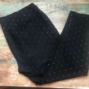 Black pants with silver shiny dots all over them!